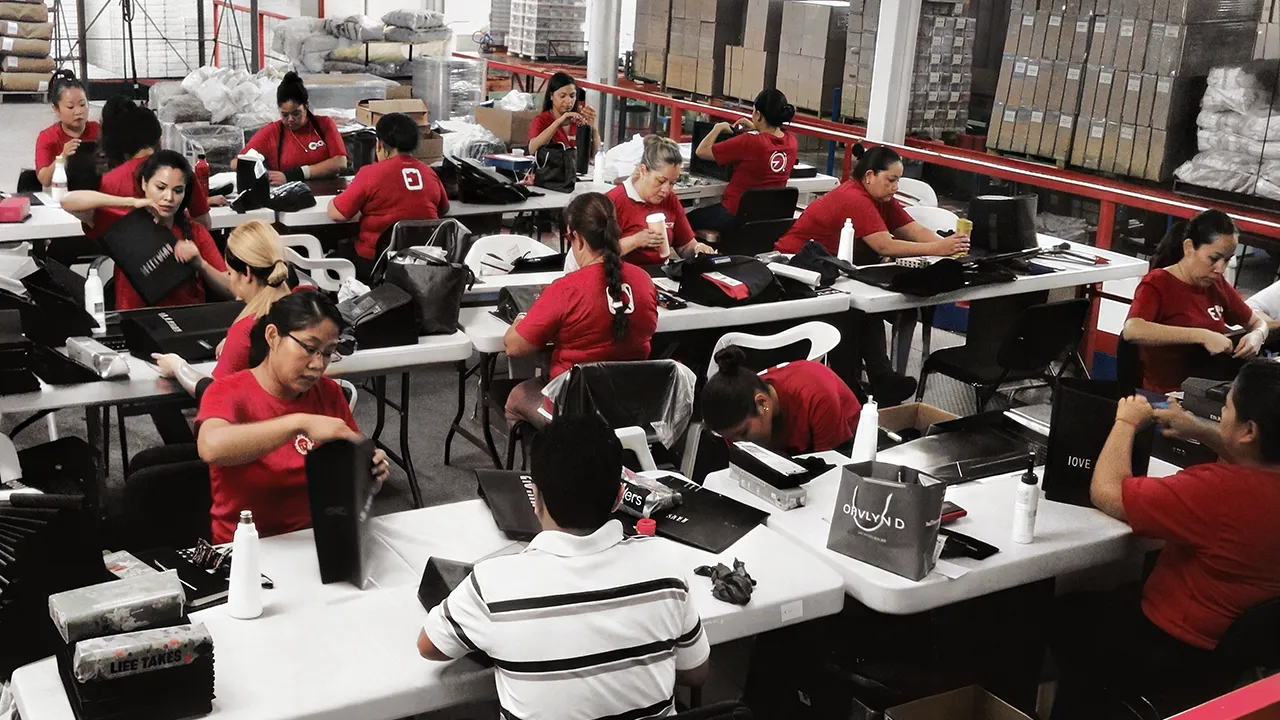 One of our shopping bag manual assembly teams