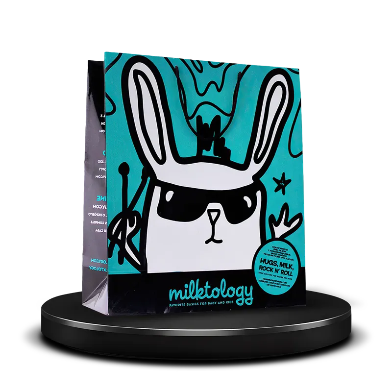 Large turquoise and black large everyday use paper shopping bag custom printed with a beautiful design featuring dark cotton cord handles